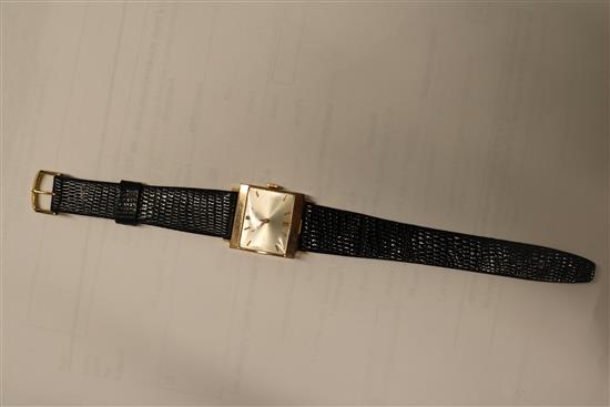A 9ct gold Longines manual wind dress watch.